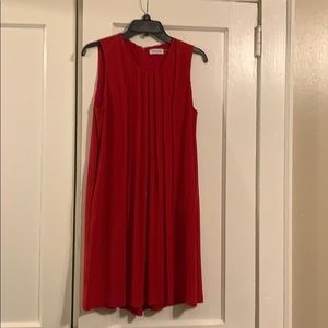Sleeveless pleated red swing dress